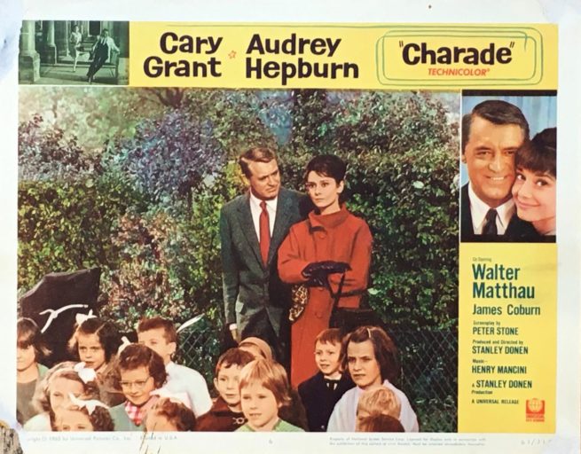 Original vintage US cinema lobby card poster for the 1963 movie starring Cary Grant and Audrey Hepburn