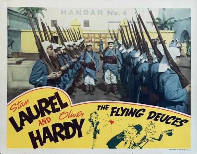 Original vintage cinema lobby card movie poster for the Laurel and Hardy comedy, The Flying Deuces