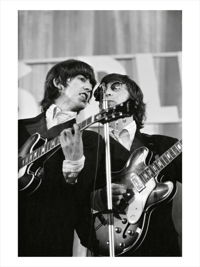 Exclusive limited edition photographic print of John Lennon and George Harrison on stage with the Beatles
